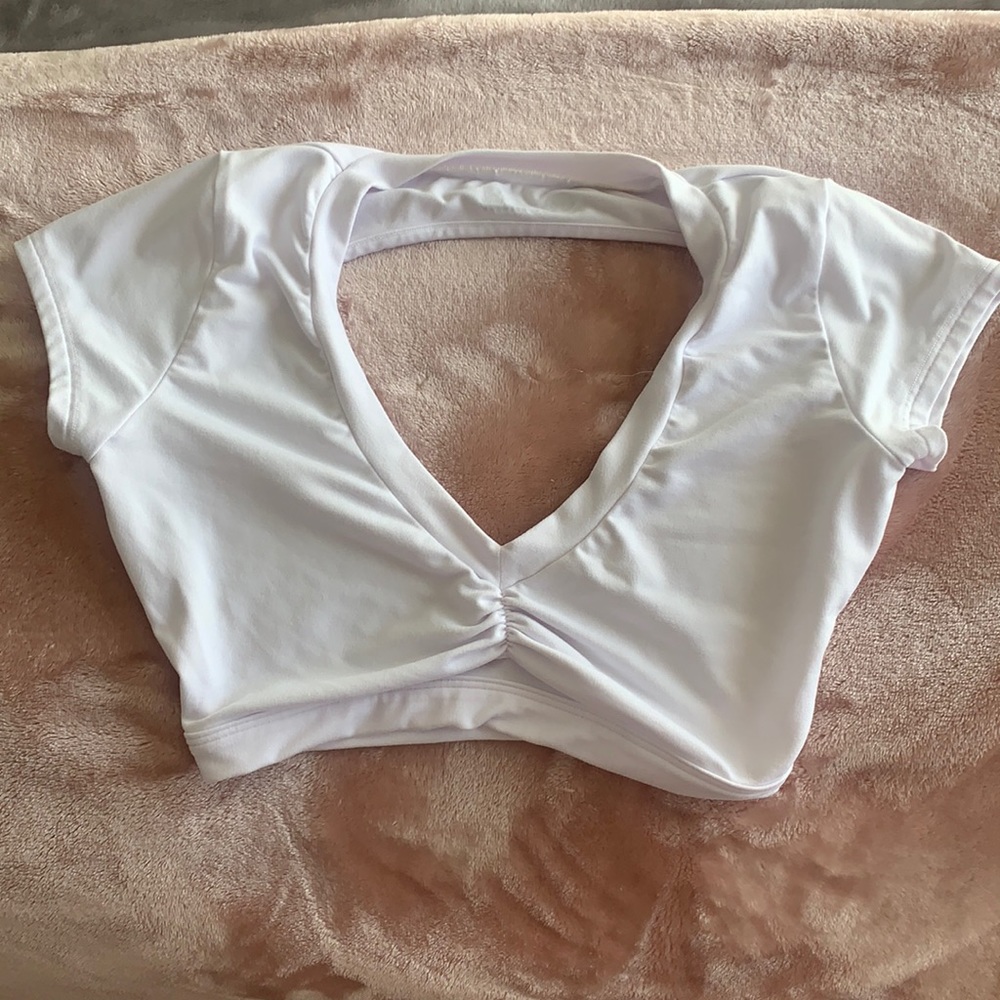 Bombshell sportswear cropped top with open back. Size S